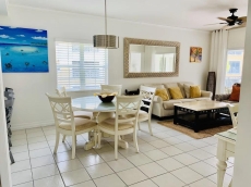 Magnificent Ocean Views in the Heart of 7 Mile Beach !! Fully Stocked !