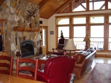 Great room with a view of the lake.  The great room is on the top level as you enter the front door.