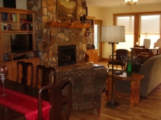 View of the great room on the second level.  This room has a gas fireplace and a large screen television.