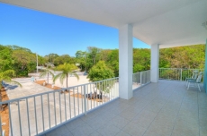 Stunning Three Level House on Main Key Largo Canal with a pool and roof deck.