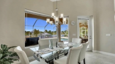 Beautiful sunrises awaits you in this remodeled pool home on a wide canal