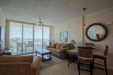 Beach Condo w/ Wrap Around Balcony, WiFi, Resort Pool & Gym Access