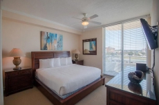 Beach Condo w/ Wrap Around Balcony, WiFi, Resort Pool & Gym Access