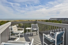 FREE DAILY ACTIVITIES!! Ocean Front 4 bedroom, 2.5 bath multi-level townhouse situated behind the dunes approximately 300 feet from the beach.