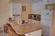 Comfortable, Top Floor Condo within Walking Distance to Beach, Shops, and Restaurants