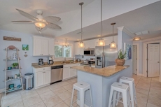 Salt Air East. 2 bed 2 bath heated pool Sleeps 6! Sunny yard, close to beach