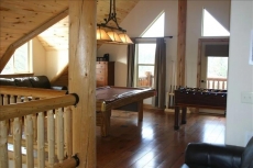 Upstairs loft with pool table & foosball (2 leather couches)